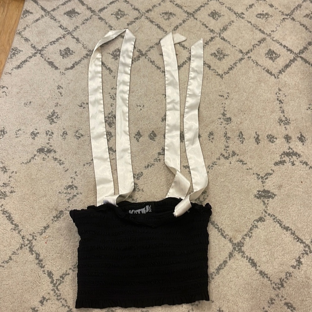 Really cute Katie J NYC black top with adjustable silk straps.